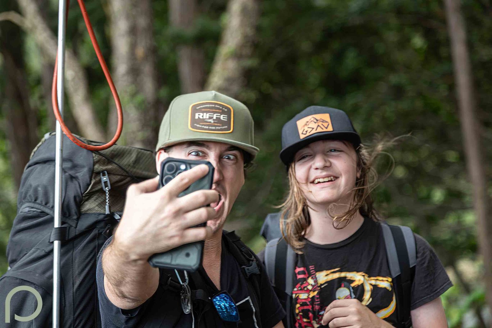 men taking a funny selfy