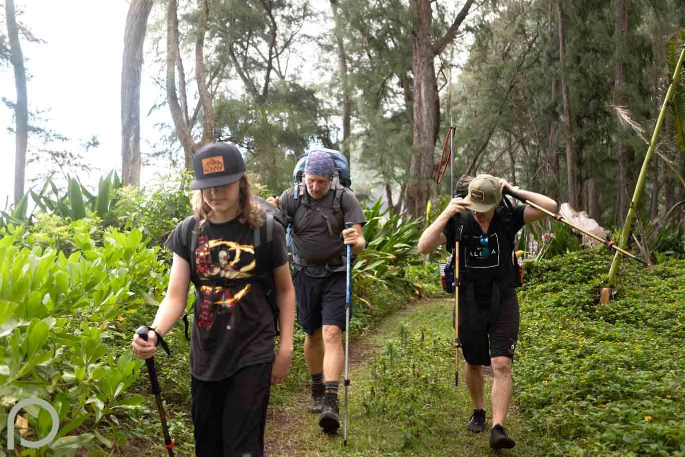 men walking on a hiking trail
